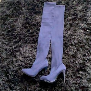 Tight thigh high boots